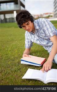 Young boy studying at the park