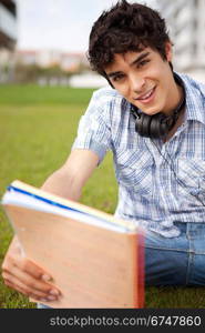 Young boy studying at the park