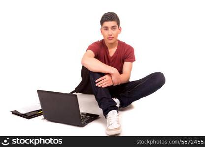 Young boy studying, isolated over a white background