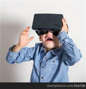 Young boy Wear Virtual Reality Digital Glasses