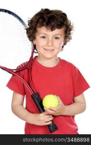 Young boy with tennis racket and ball