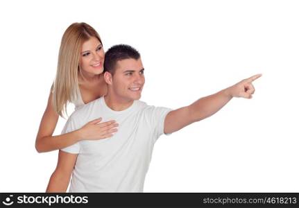 Young boyfriends looking at where the guy is pointing isolated on a white background