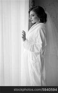 Young bride near the window (monochrome)