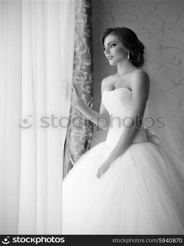 Young bride near the window (monochrome)