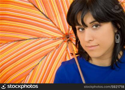 young brunette girl with a collored umbrella