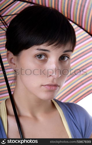 young brunette girl with umbrella in colors