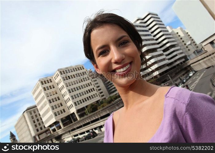 Young brunette in city centre