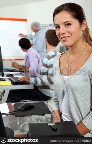 Young brunette in class