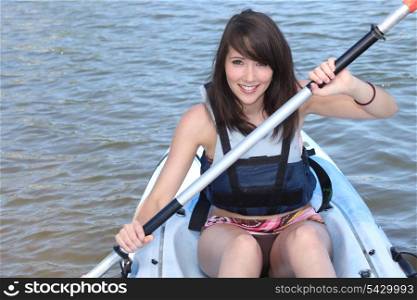 #young brunette in kayak
