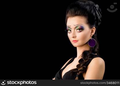 young brunette with creative makeup posing, studio shot