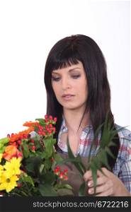 Young brunette with flowers
