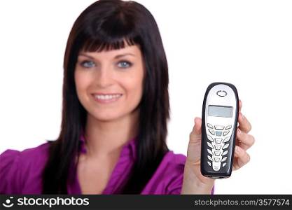 Young brunette with telephone
