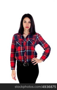 Young brunette woman with plaid shirt and black jeans isolated on a white background