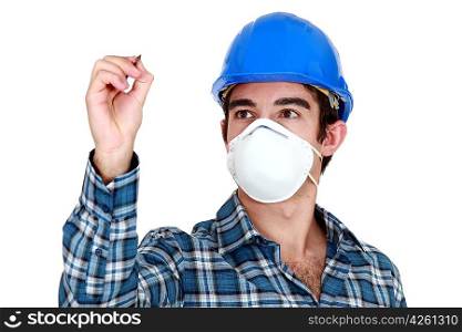 Young builder wearing a mask