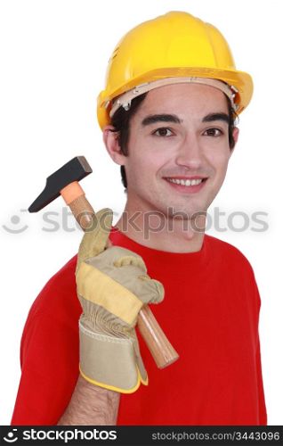 Young builder with a hammer