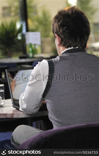 Young buisinessman sitting and working on buisiness solution