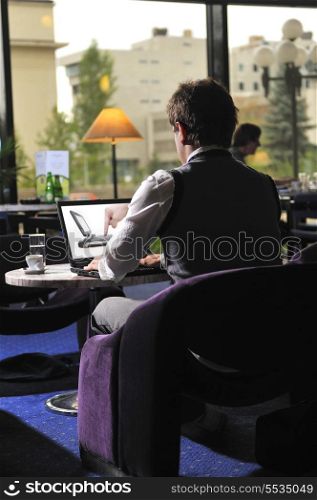 Young buisinessman sitting and working on buisiness solution