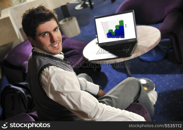 Young buisinessman sitting and working on buisiness solution