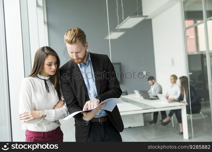 Young business couple working in the office