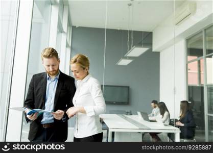 Young business couple working in the office