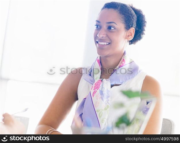 Young business lady in an office