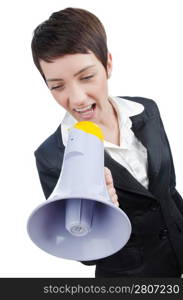 Young business lady screaming to loudspeaker