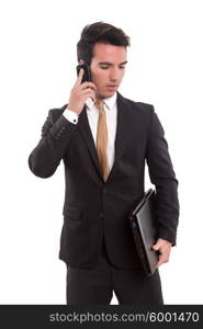 Young business man at the phone, isolated over white