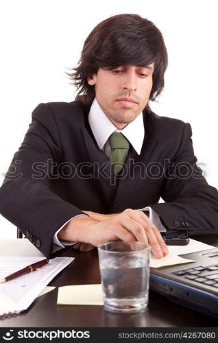 Young business man at work, isolated over white