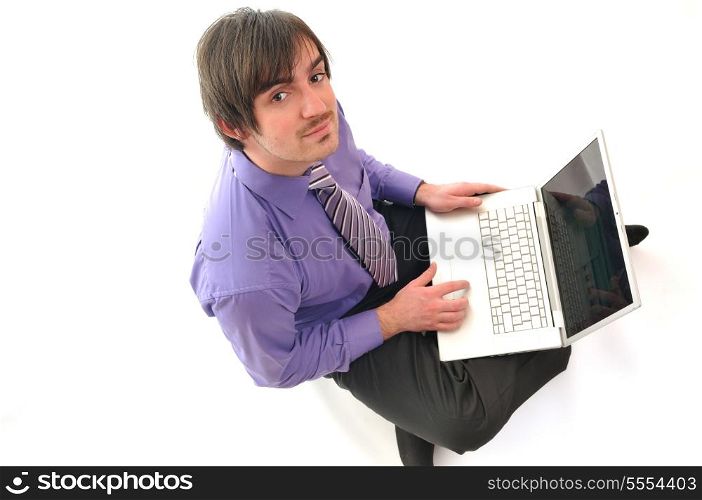 young business man in pink work on laptop isolated