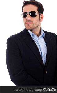 Young business man looking right wearing his sunglasses on a white background