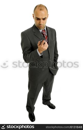 young business man looking worried to his phone, isolated
