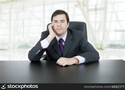 young business man on a desk, at the office
