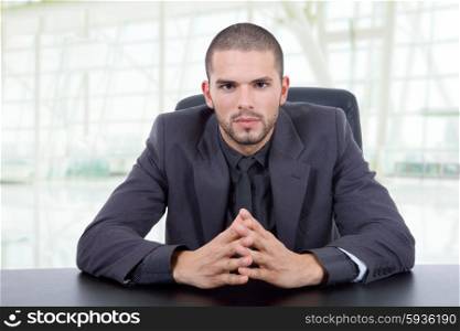 young business man on a desk, at the office