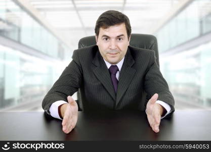 young business man on a desk, at the office