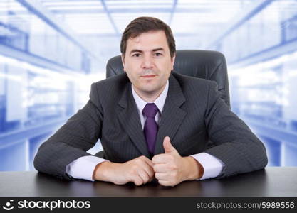 young business man on a desk, at the office