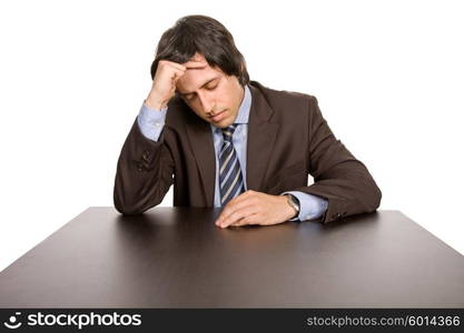 young business man on a desk, isolated on white