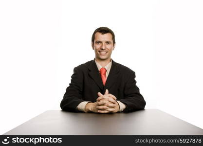 young business man on a desk, isolated on white&#xA;