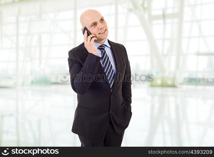 young business man on the phone, at the office