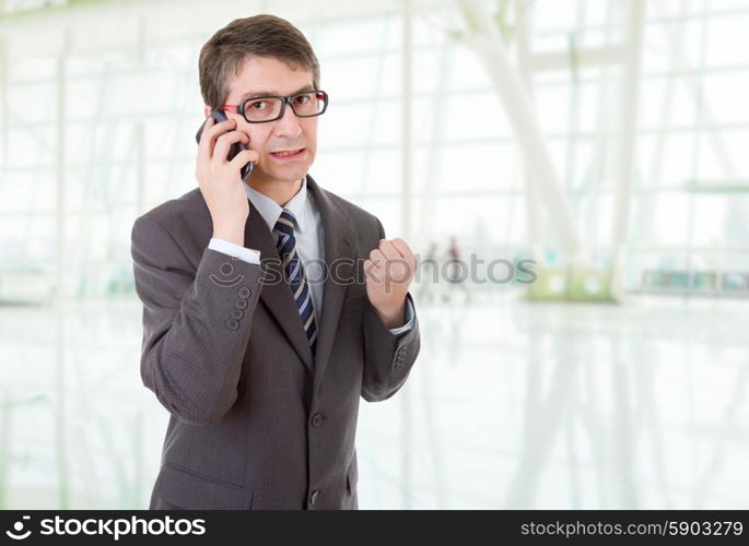 young business man on the phone, at the office