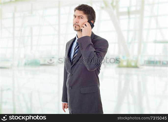 young business man on the phone, at the office