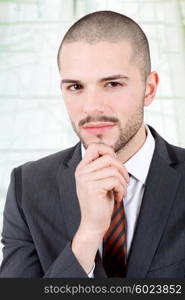 young business man portrait at the office