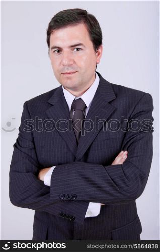 young business man portrait on a grey background