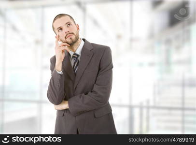 young business man thinking at the office