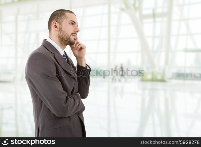 young business man thinking at the office