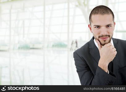 young business man thinking at the office