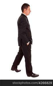 Young business man walking, isolated over white