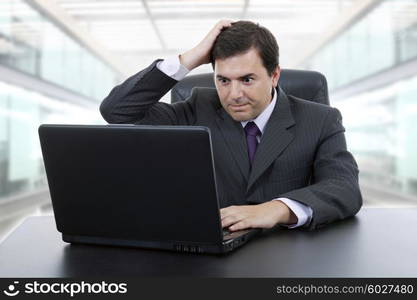 young business man working with is laptop