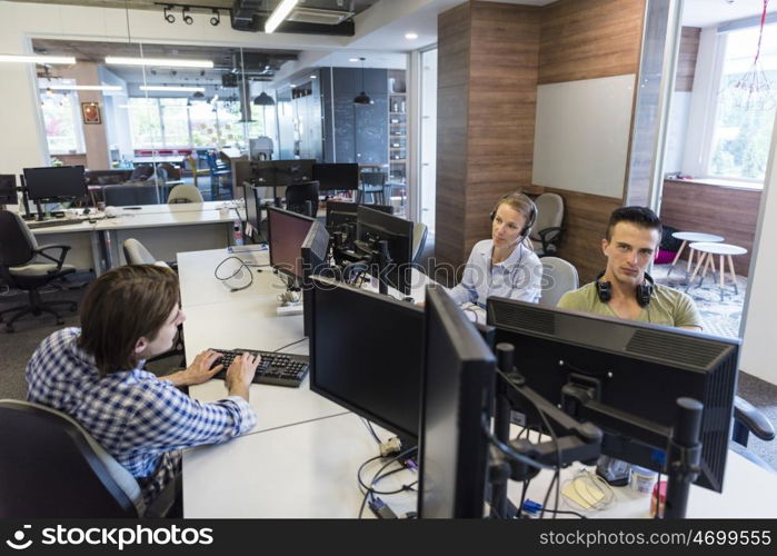 young business people at modern office workplace getting social in free time