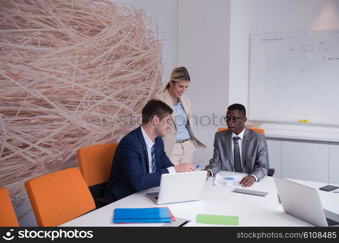 young business people group have meeting and working in modern bright office indoor