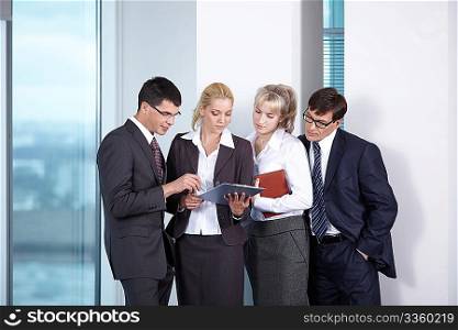 Young business people in suits working